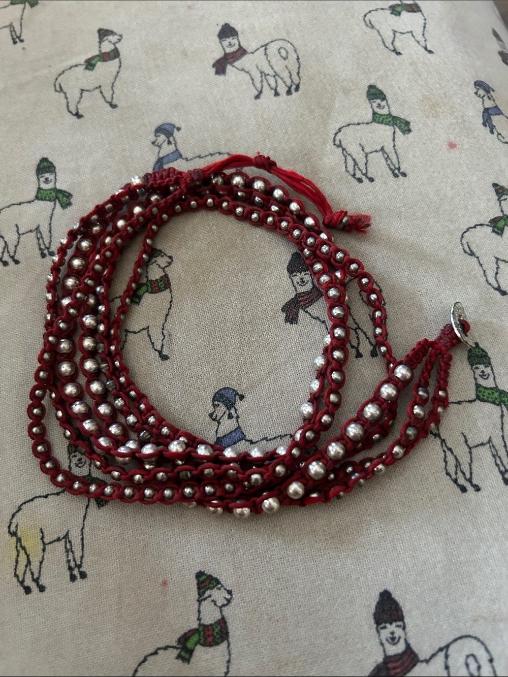 Silver and cord wrap bracelet